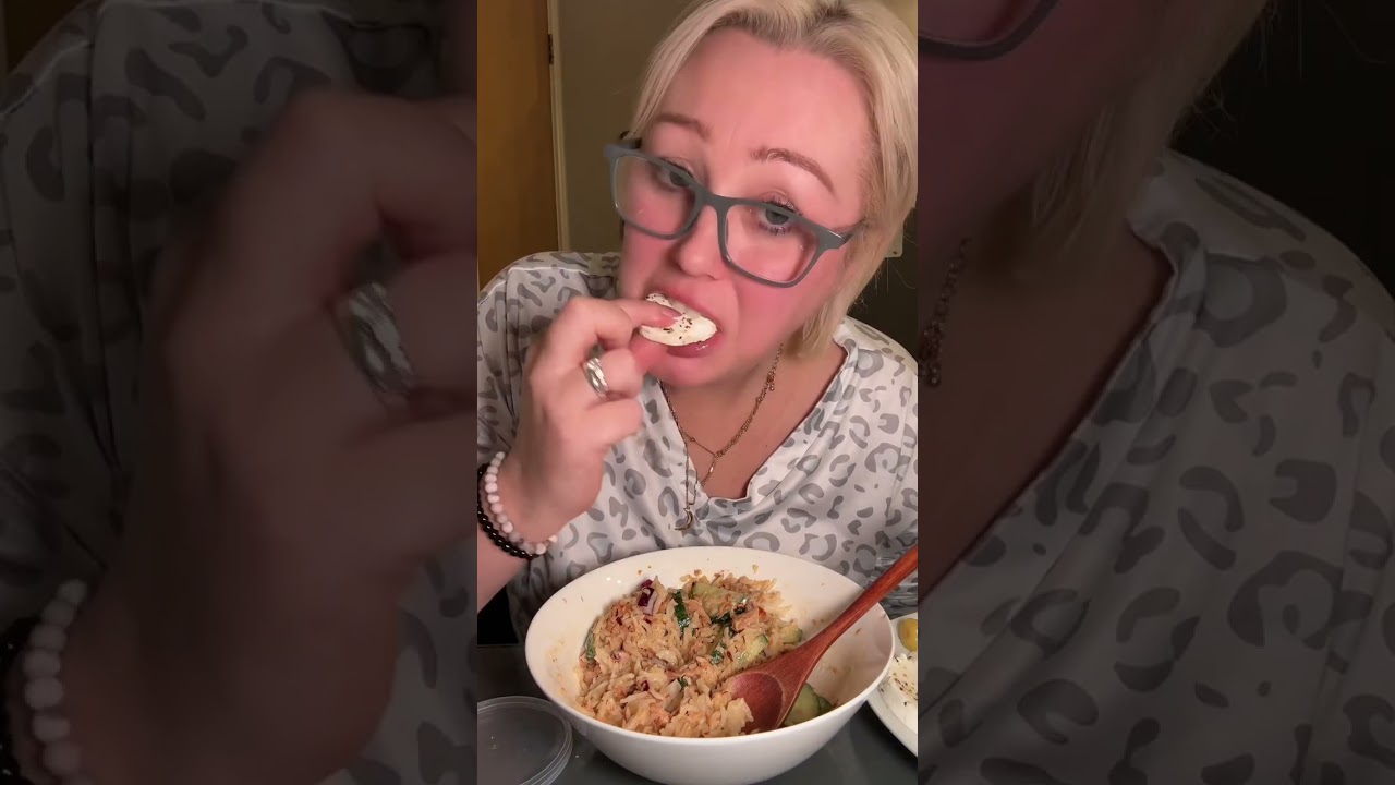 Eating spicy tuna rice bowl