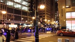 Protesters march along State Street in Chicago, 12/4/2014