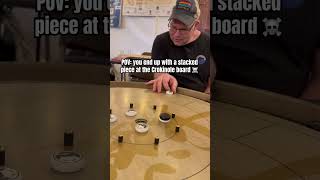 Stacked Piece at the Crokinole Board