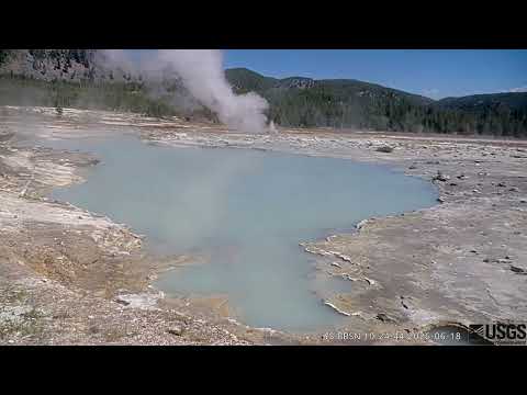 Jets of water spray up from a new pool in Yellowstone National Park