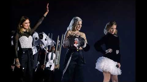 Julia Michaels performs on stage with Clean Bandit during MTV EMAs 2017 held at SSE Arena