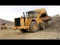 Rock & Roll: CAT 990H loading 773B's