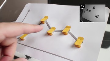 Tangible Interfaces with Printed Paper Markers
