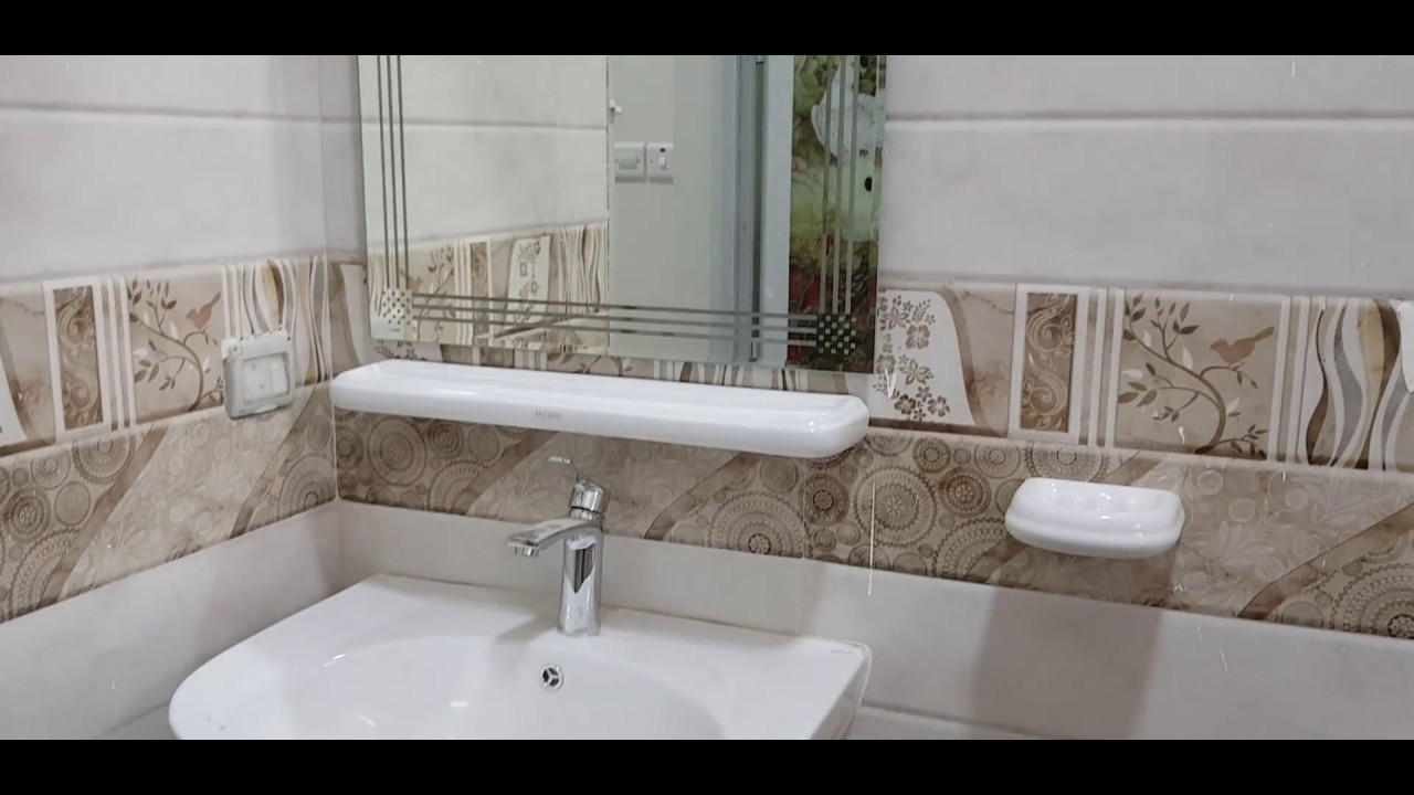 Designed Mirror Glass Installation and Fitting in the Bathroom Basin