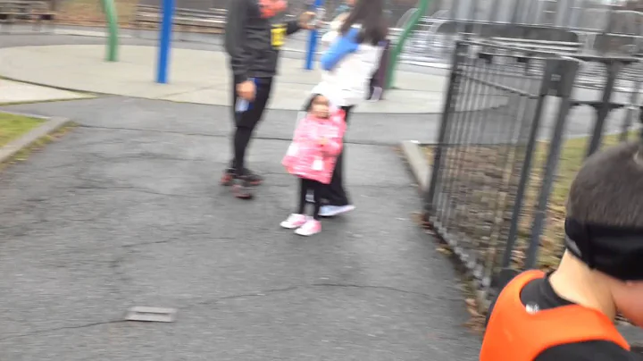 Phillip Tabbitas, 11, sprints across finish line. ...