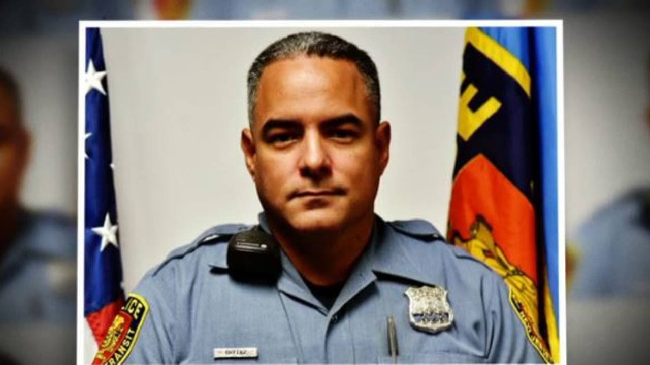 Transit cop rescues man seconds before being hit by train - YouTube