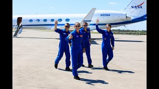 International crew arrives at Kennedy Space Center