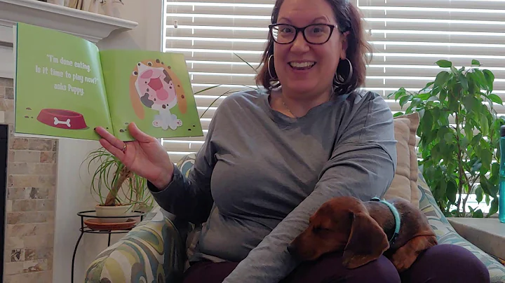 Ms. Debbie reads with her puppy