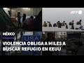 A merced de criminales, miles de mexicanos buscan refugio en EEUU | AFP