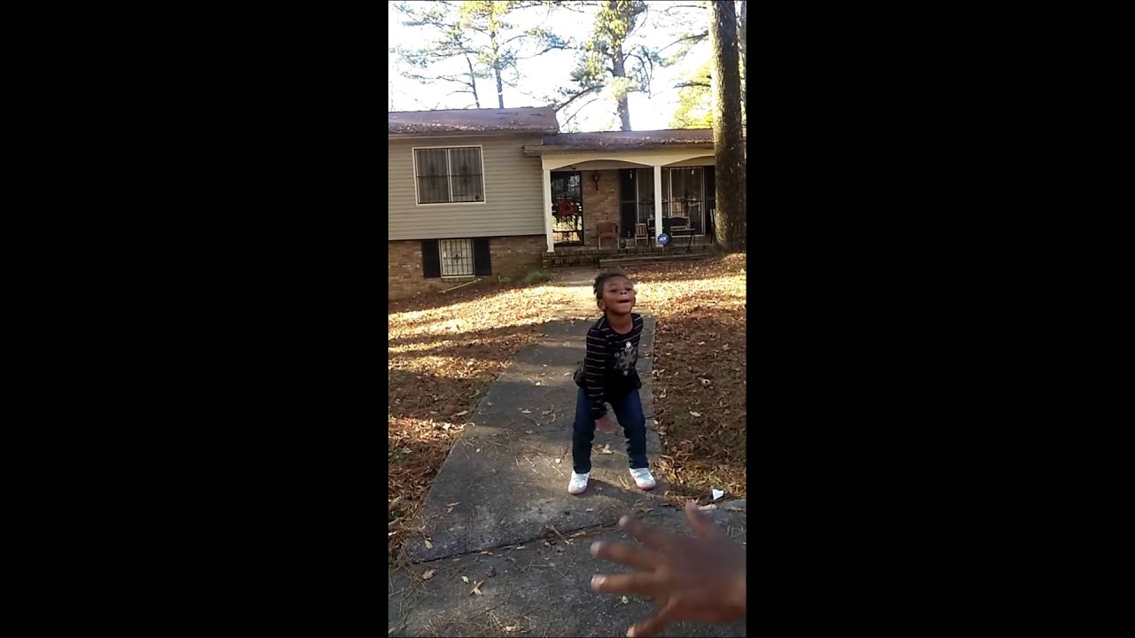 A 3 year old baby doing bet you can't do it like m