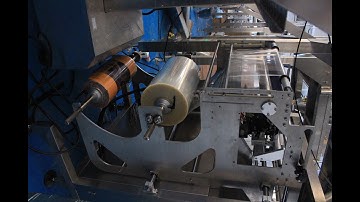 how to install the new roll film for the vertical packing machine