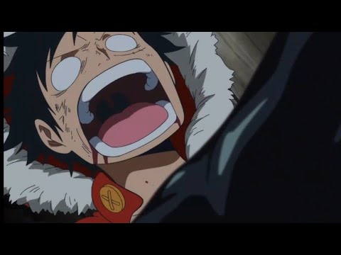 Luffy got hard punched in the stomach and knocked out