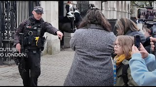 THE FAMOUS ARMED OFFICER REPRIMANDS Tourists!! GO BACK!! KEEP GOING BACK!!