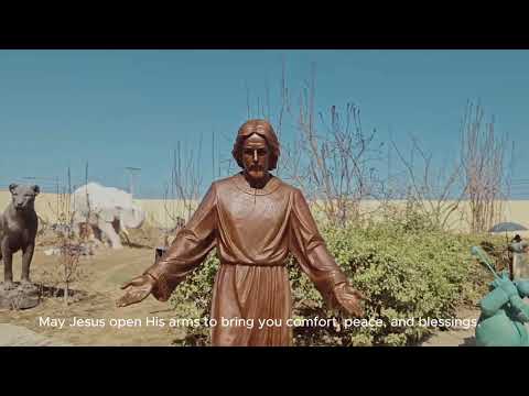 Open arm bronze Jesus sculpture