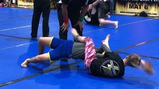 Girl Subs Boy With Armbar in No Gi Jiu Jitsu Match