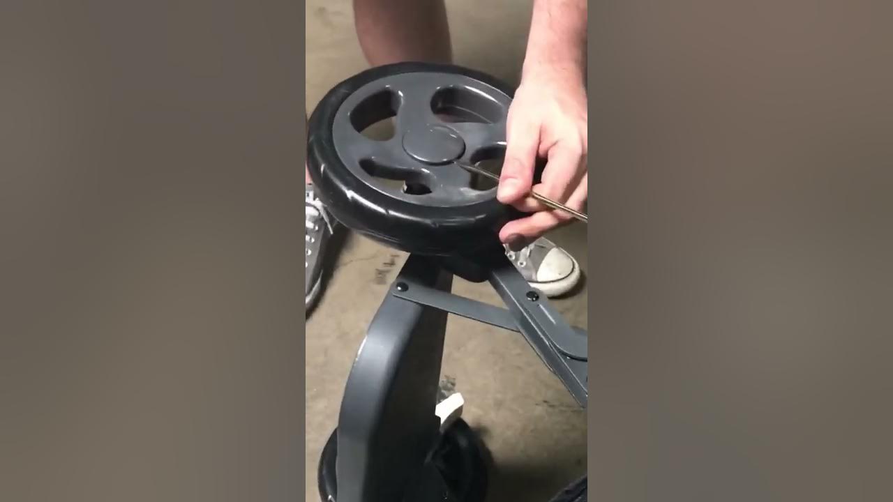 Joovy Caboose How to Remove the Rear Wheels YouTube
