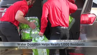 Nearly 1,000 get bottled water at Campbell donation sites