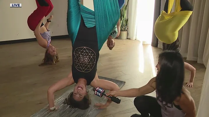 Aerial yoga in Royal Oak turned FOX 2's Robin Murd...