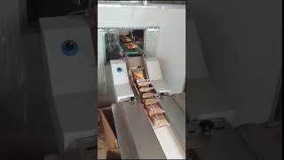 Automatic biscuit stacking machine, Stacking of packed biscuit Machine, Packet sorting machine