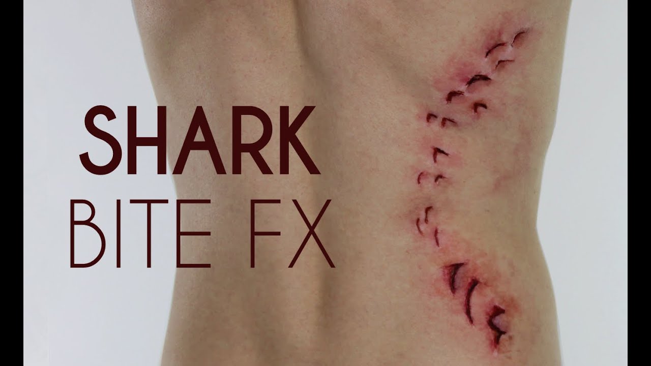 Shark bite scar tattoo