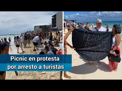 Con picnic, protestan por arresto de turistas en playa de Quintana Roo