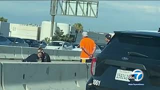 Video: Fight breaks out on 60 Freeway in Ontario after crash, officer tackles men to ground | ABC7