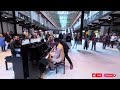 Piano duel on 2 pianos leaves crowd in awe unexpected contribution