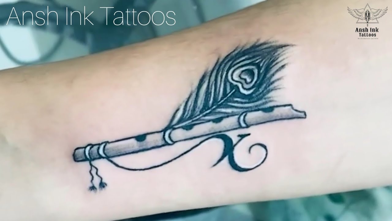 Mirage Tattoos - Did this few day ago. Flute Tattoo, Peacock Feather Tattoo  made by Mirage Tattoos in Dwarka, Delhi, India. Tattoo ideas for first  timer who planning to get inked. Stay