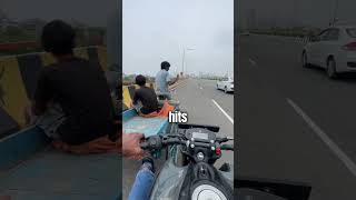 Biker Helps Man on The Road