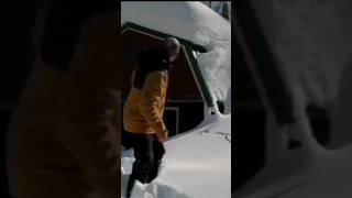 Removing Snow On Roof Of Tiny Cabin With A Rope. cabin offgrid winter