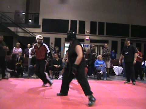 Joshua Young fighting in Black Belt Hvywt at 2010 Tournament of Champions