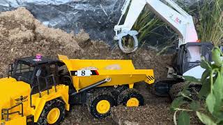 RC dump truck in action transporting mountain rocks!!!@#
