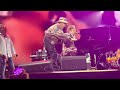 Molly Meldrum climbs onstage Elton John concert Melbourne 13 Jan 2023