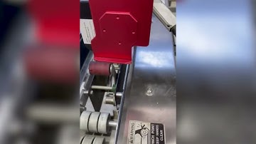 SNEED-JET® Titan Thermal Inkjet Printer Installed onto Case Sealer