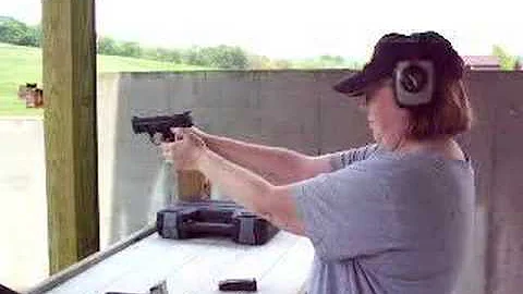 Shooting 5/18/08 Cathy Shooting SW MP9c w/ Federal...