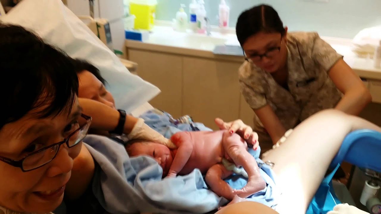 Dad Cutting Umbilical Cord