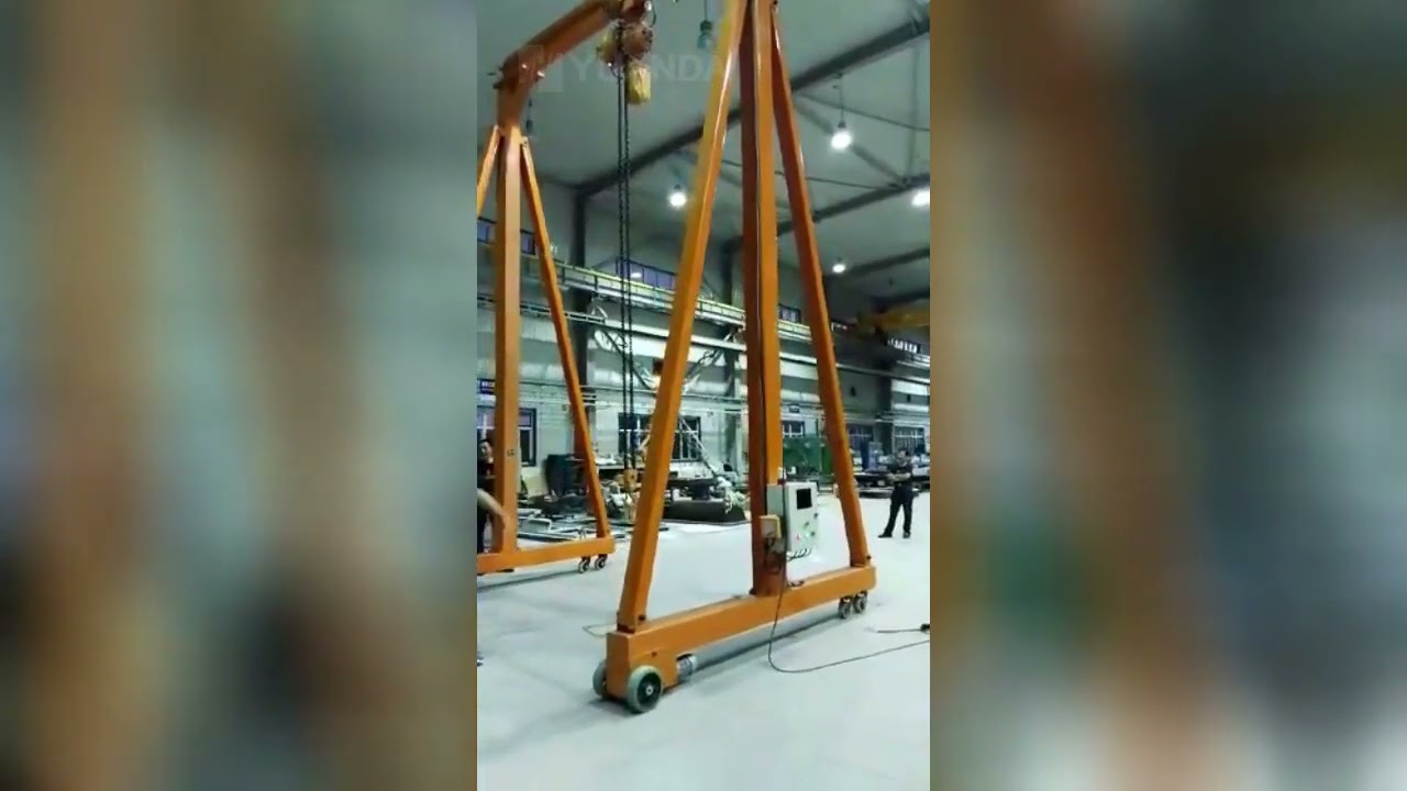 A frame portable mobile gantry crane travelling on rubber tyres