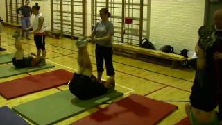 Partner Supine Leg Lifts with Pike & Push Down.wmv
