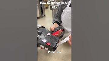 Showing how to change the paper for the Price Gun.