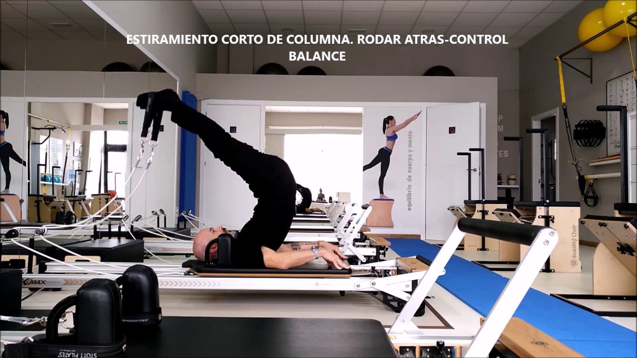 PILATES REFORMER. ESTIRAMIENTOS DE COLUMNA.STUDIO PILATES LUGO 