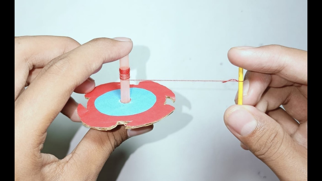 Cardboard spinner - YouTube