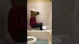 A man-horse playing &quot;The Four Horsemen&quot; by Metallica on a bucket in the shower