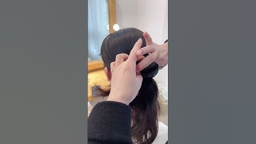 Cách làm 01 kiểu tóc búi thấp