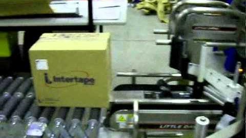 Labelling Technologies UT2mAC Labeller at a case sealer