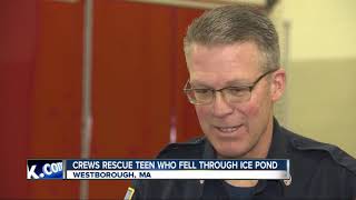 Boy rescued after falling through ice on frozen pond