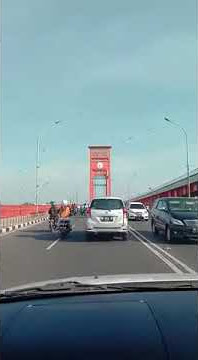 Story WA IG Jalan Jalan Siang hari Jembatan Ampera Palembang