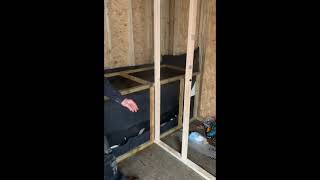 Constructing studwork top tip with sole plate in door way.