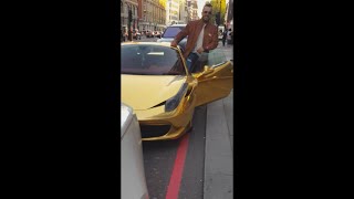 Iraqi Kickboxing Millionaire lets a man take a picture with his GOLD CHROME Ferrari 458!