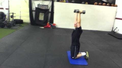 tonygentilcore.com Tall Kneeling to Standing Overhead DB Hold