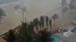 اخبار اليوم برازيل اعصار يضرب شاطئ ويرفع الناس في الهواء